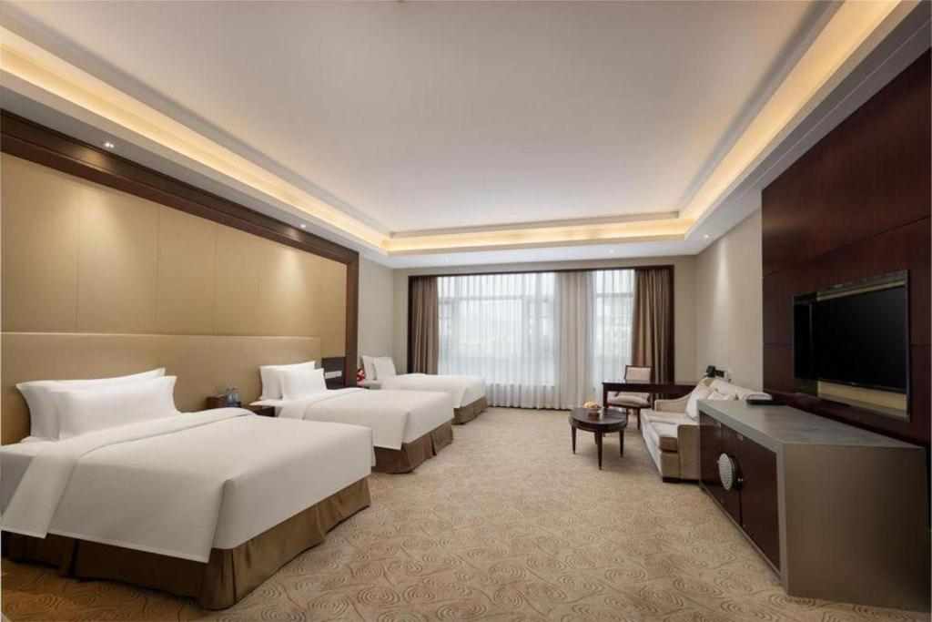 Linyi Blue Horizon International Hotel Yi He Extérieur photo